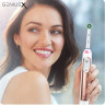 Электрическая зубная щетка Oral-B Genius X Cross Action D706.513.6 (розовое золото) Электрическая зубная щетка Oral-B Genius X Cross Action D706.513.6 (розовое золото)