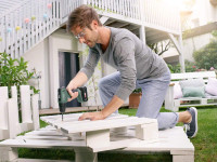 Дрель-шуруповерт Bosch UniversalDrill 18 06039C8002 (с 2-мя АКБ)